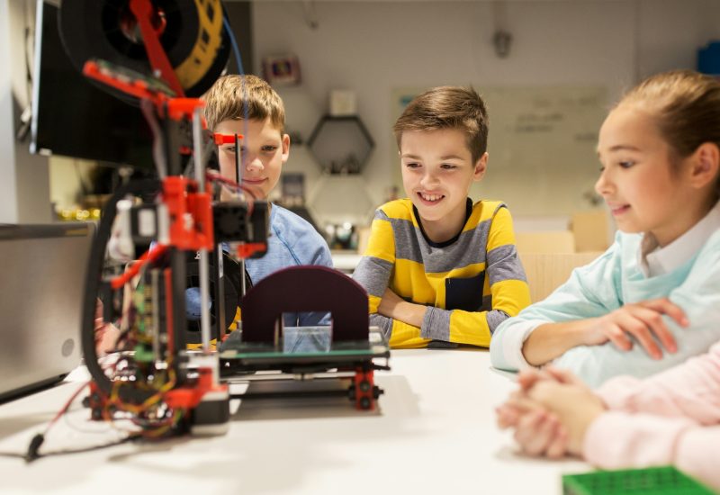 happy-children-with-3d-printer-at-robotics-school-2.jpg